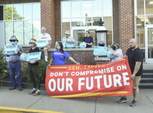 Green advocates rally outside Sen. Capito's office to urge her support for $3.5T social infrastructure bill